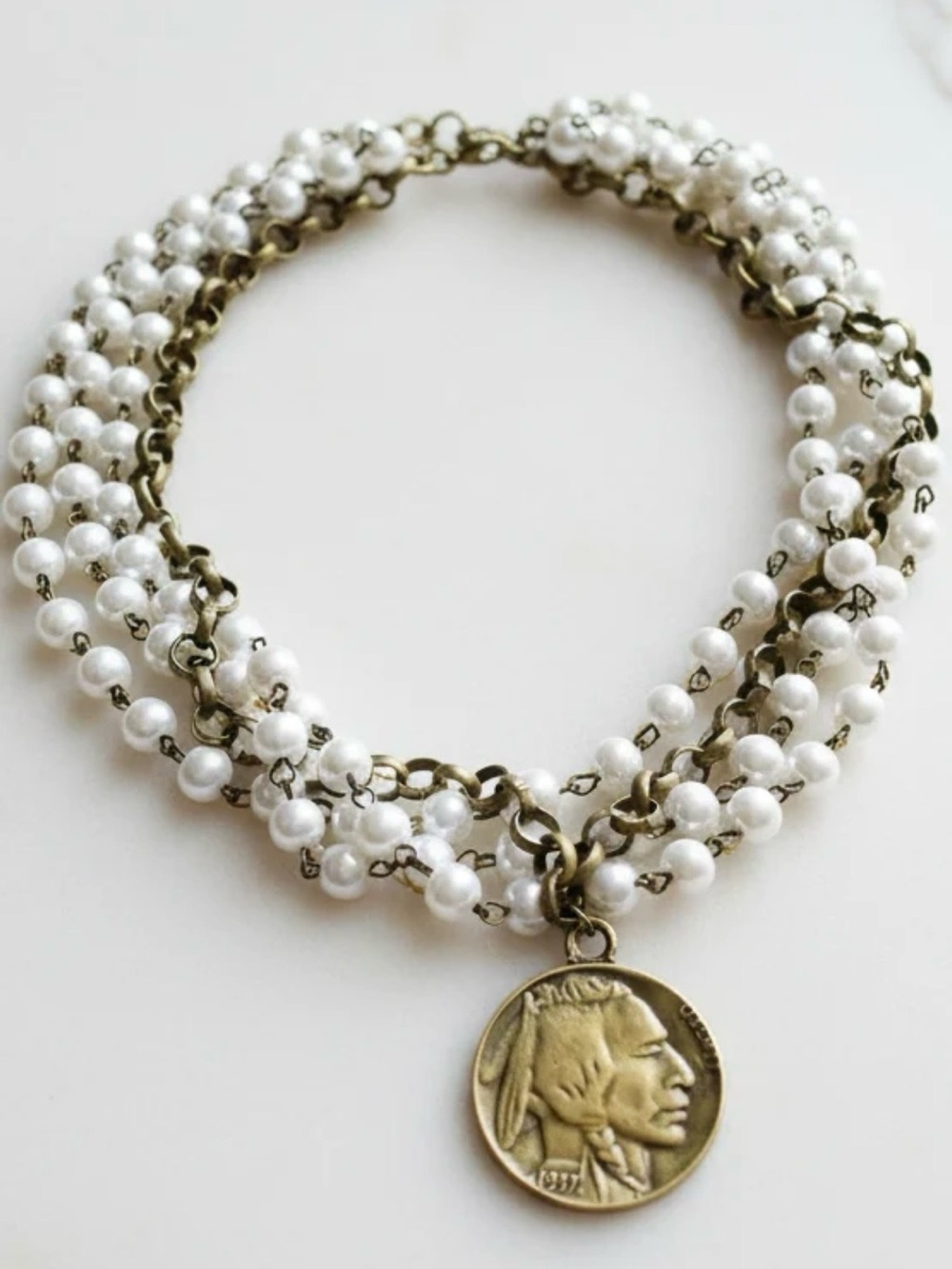 Vintage-Inspired White Pearl Multi-Strand Necklace with Bronze Coin Pendant